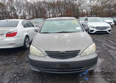 2002 Toyota Camry Le z USA, uszkodzony, nr VIN 4T1BE32K92U549374